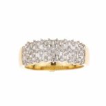 DIAMOND RING.Yellow gold with brilliant, baguette & trapeze cut diamonds. Total weight approx.1ct.