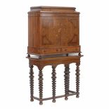 SPANISHBARGUEÑO C20thIn two parts, wood with floral motif marquetry. Nine internal drawers with bone