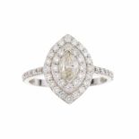 DIAMOND RINGWhite gold with navette cut approx. 0.29ct. diamond, bezel of brilliant cut diamonds.