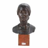 JOSEP LLIMONA BRUGUERA(1864-1934) "MODESTY"Feminine bust in patinated bronze on marble pedestal.