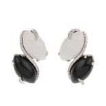 ONYX AND DIAMOND EARRINGSWhite godl with brilliant cut diamonds. Total weight approx. 0.05ct. &