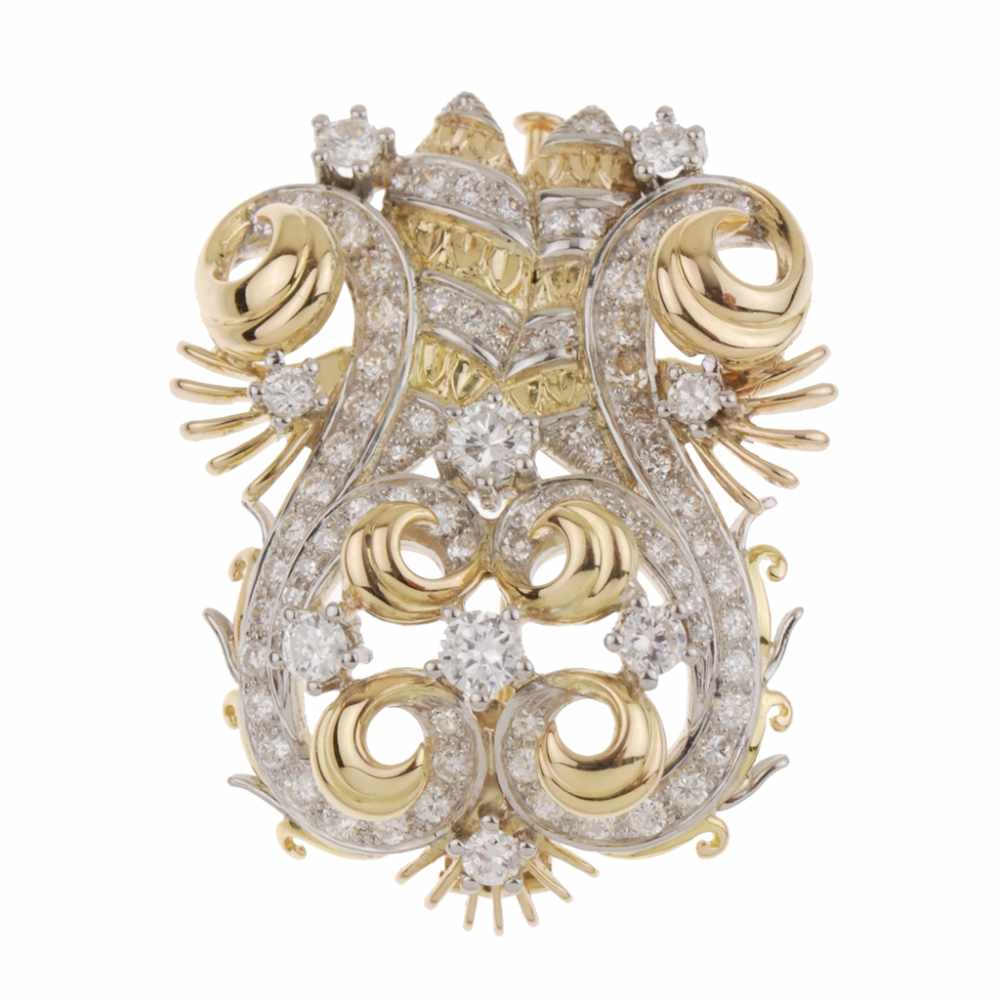 1950s BROOCHGold & white gold with brilliant cut diamonds. Total weight approx. 1.17ct. 4 x 2.