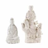 LOT OF THREE GUANYIN FIGURES, C20th."Blanc de Chine" porcelain. One has a defect. Heights 28 cm;