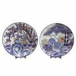TWO JAPANESE PLATES, C20th.Painted and gilded porcelain. Signed. 59 cm. diam.- - -18.00 % buyer's