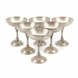 SIX SPANISH SILVER CAVA COUPES, MID C20th.Hallmarked. 867 gm with counterweight.- - -18.00 % buyer's