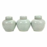 THREE CHINESE JARS. C20th.Celadon porcelain. Stamps on base. Height 21 cm.- - -18.00 % buyer's
