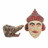TWO INDONESIAN MASKS, C20th.Painted wood. 30 x 22.5 cm; 14 x 14 x 22 cm.- - -18.00 % buyer's premium