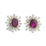 DIAMOND AND RUBY EARRINGS, MID C20th.White gold with trapeze cut diamonds total approx. weight 3.