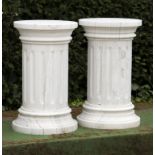 Pedestals/Plinths: A pair of carved white veined marble pedestalsmodern117cm high