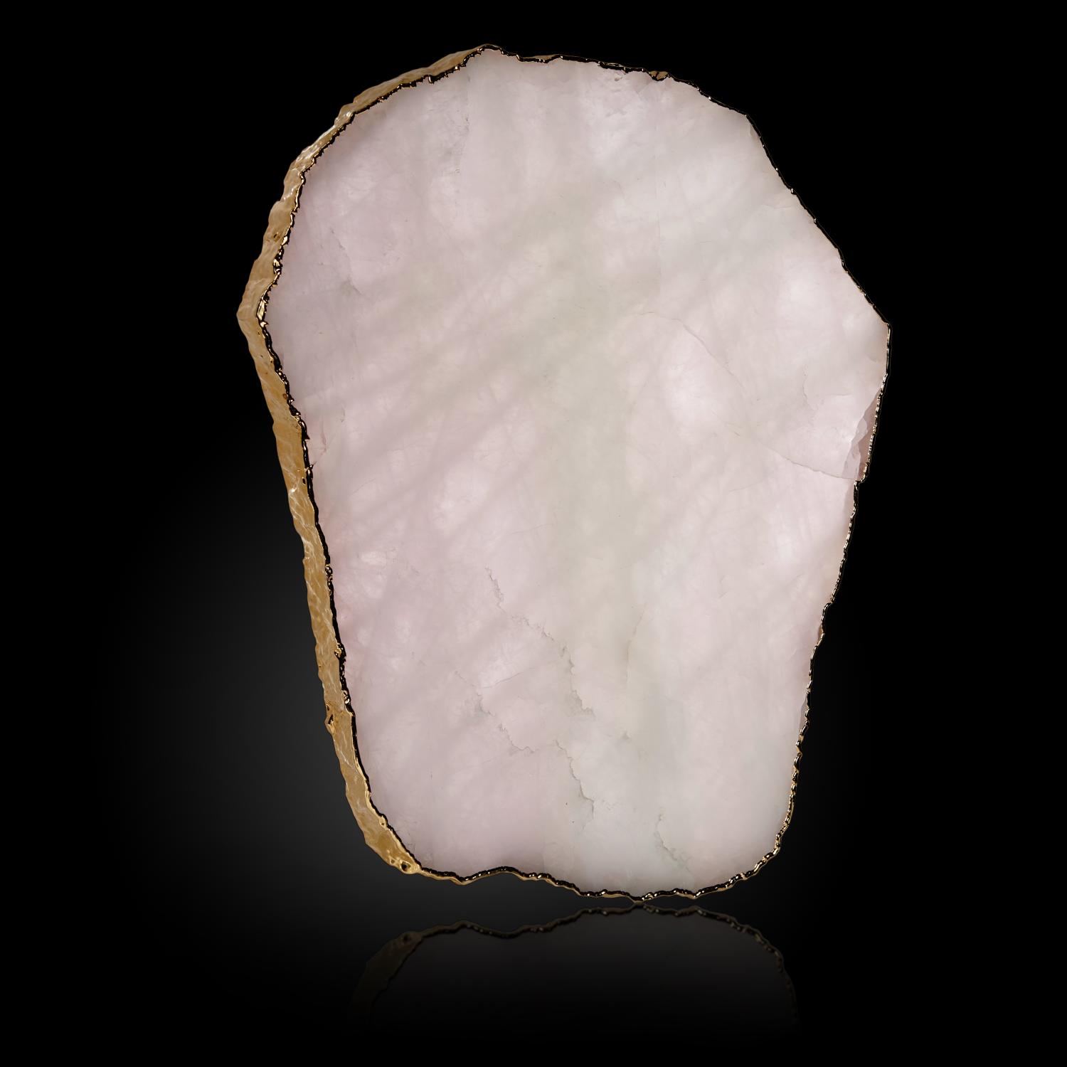 Minerals: Three gilt edged mineral slices quartz and calcitethe largest 40cm