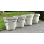 Planters/Pots: ‡ A set of four composition stone tapering cylindrical plantersearly 21st century52cm