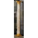 Architectural: A pair of impressive veined marble columns19th centurywith ormolu Corinthian capitals