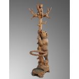 Furniture: A carved walnut Black Forest stick standBavarian, 2nd half 19th century204cm highBlack