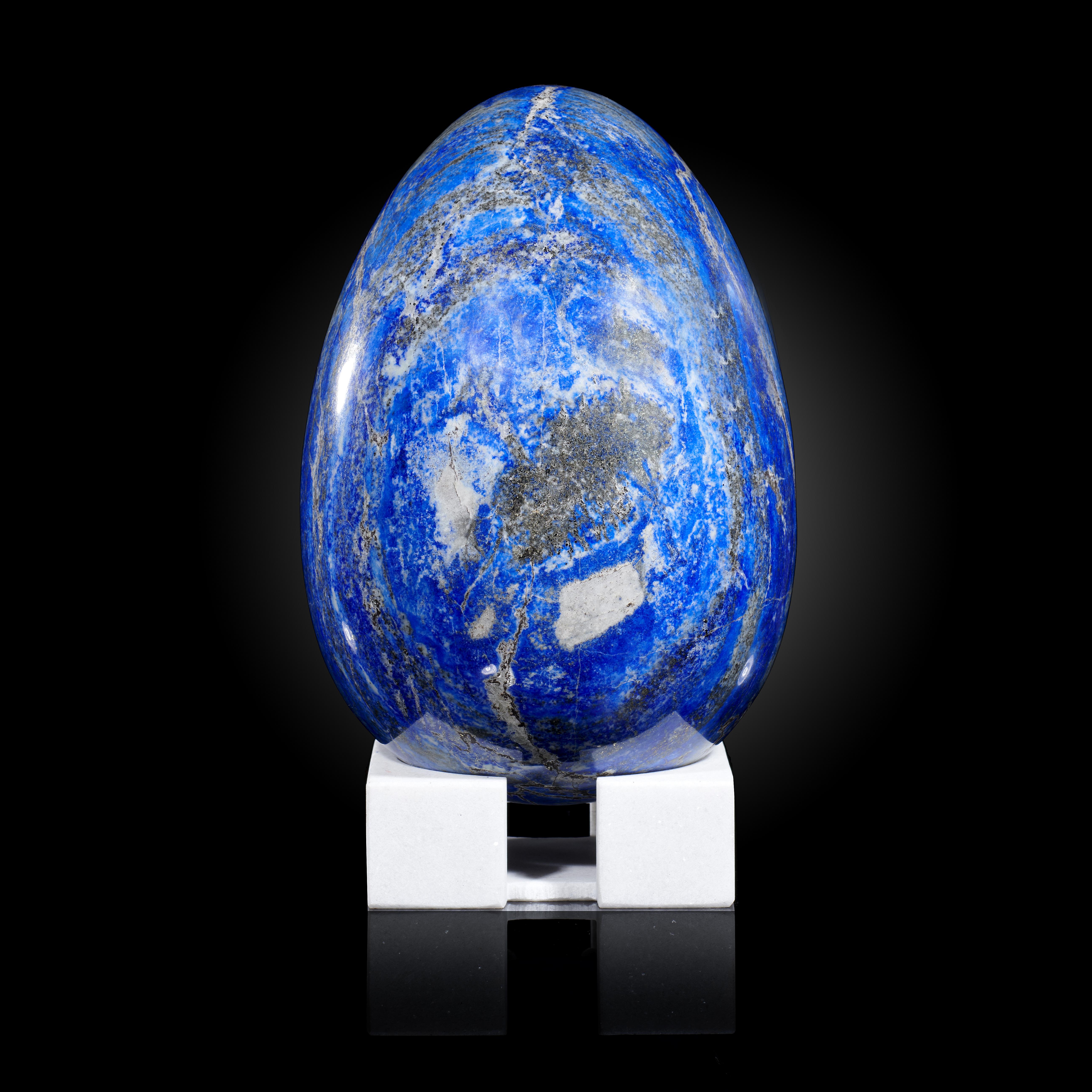 Minerals: A large lapis lazuli egg on standAfghanistan24cm high overall, 6.9kg