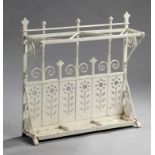 Interior: An unusual wrought iron stick standlate 19th centurywith lift out drip tray82cm wide