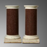 Architectural: A pair of red granite column pedestals19th centurywith white marble caps and