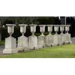 Planters/Pots: ‡ A set of four composition urns on pedestalslate 20th century158cm high