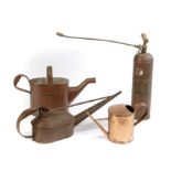 Garden Tools: A collection of three copper watering cans1st half 20th century the largest 60cm long,