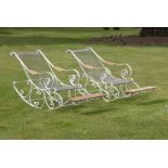 Garden Seats: A wrought iron and mesh rocking chairmodernwith wooden foot and arm rests172cm long