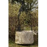 Water Features: A carved stone wellheadFrench, 18th/19th centurywith later wrought iron
