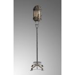 Lighting: A Venetian wrought iron glazed lantern on stand, 19th century, 220cm high