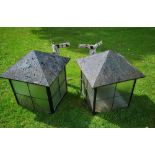 Lighting: A pair of sheet iron outside wall lights, 20th century, with corner brackets, 60cm high by