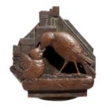 Decorative/Interior Design: An unusual small bronze door knocker in the form of a bird feeding