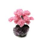 Interior Design/Minerals: A rose quartz tree with fifteen petals, on amethyst and composition base,