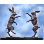 Sculpture: ▲ John Cox, Boxing Hares, Bronze with foundry stamp on a reclaimed oak base, 72cm high by