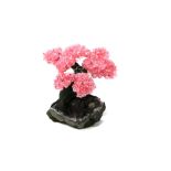 Interior Design/Minerals: A rose quartz tree with nine petals, on amethyst and composition base,