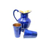 Interior Design/Minerals: A lapis lazuli water jug and cups, cups 11.5cm high by 8cm wide, jug 21.