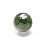 Interior Design/Minerals: A serpentine sphere, 9cm diameter, 1.3kg