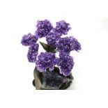 Interior Design/Minerals: An amethyst tree with nine petals on composition and amethyst base,