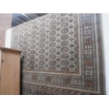 Green ground Bokhara carpet 2.3m x 1.6m