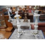 4 lamps and candle holder