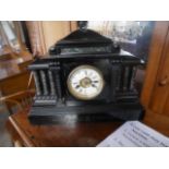 Antique black mantle clock