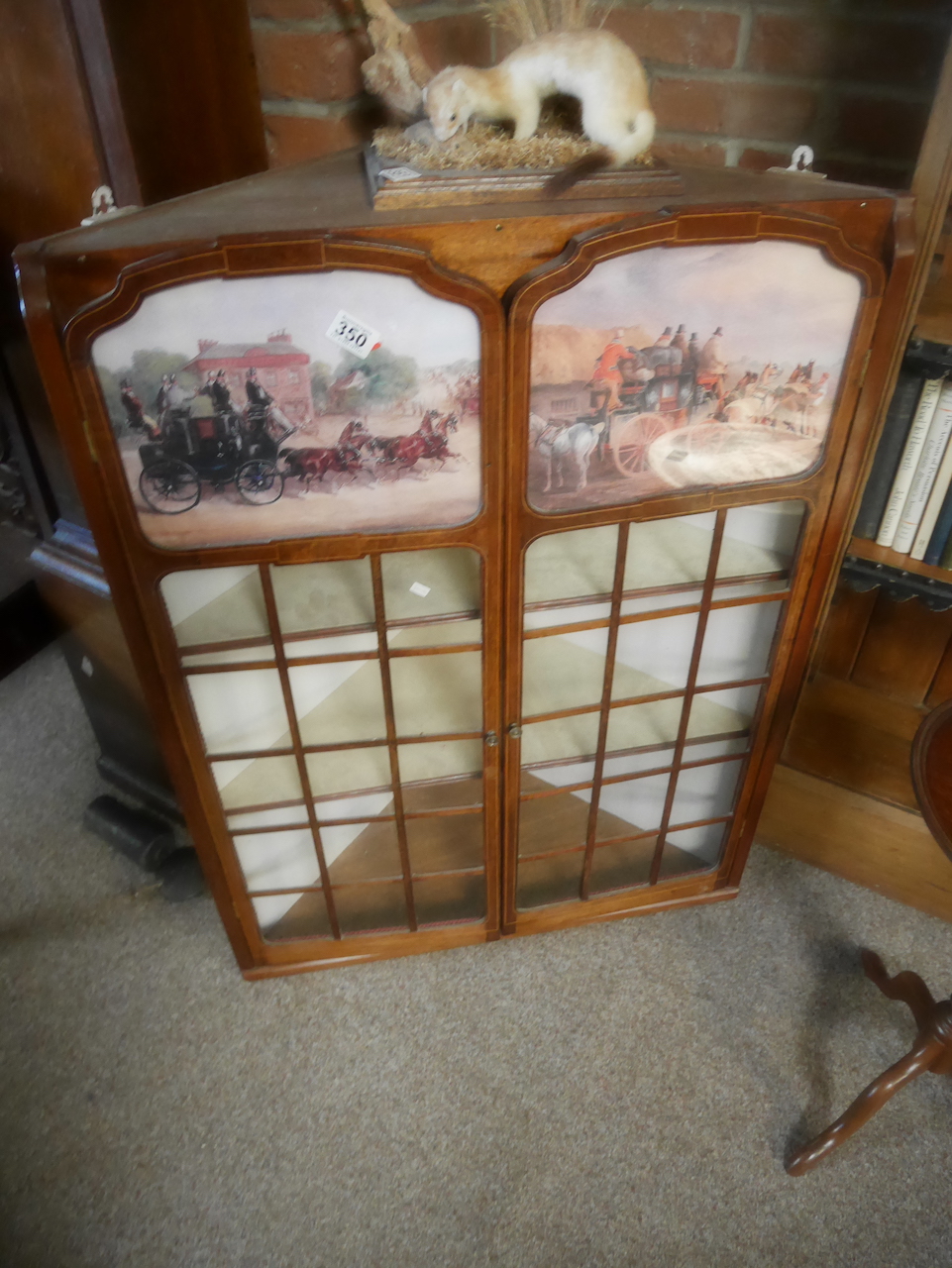 Inlaid Mahogany glass front corner cupboard with coaching pictures