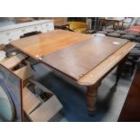Antique extending dining table (2 leaves)