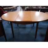 Teak extending dining table "Nathan furniture"