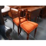 2 Victorian mahogany balloon back chairs