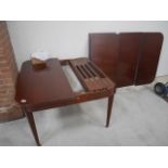 Extending mahogany dining table