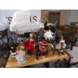 6 dolls and 2 prams