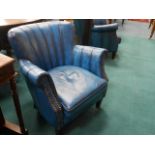Pair of blue leather tub chairs