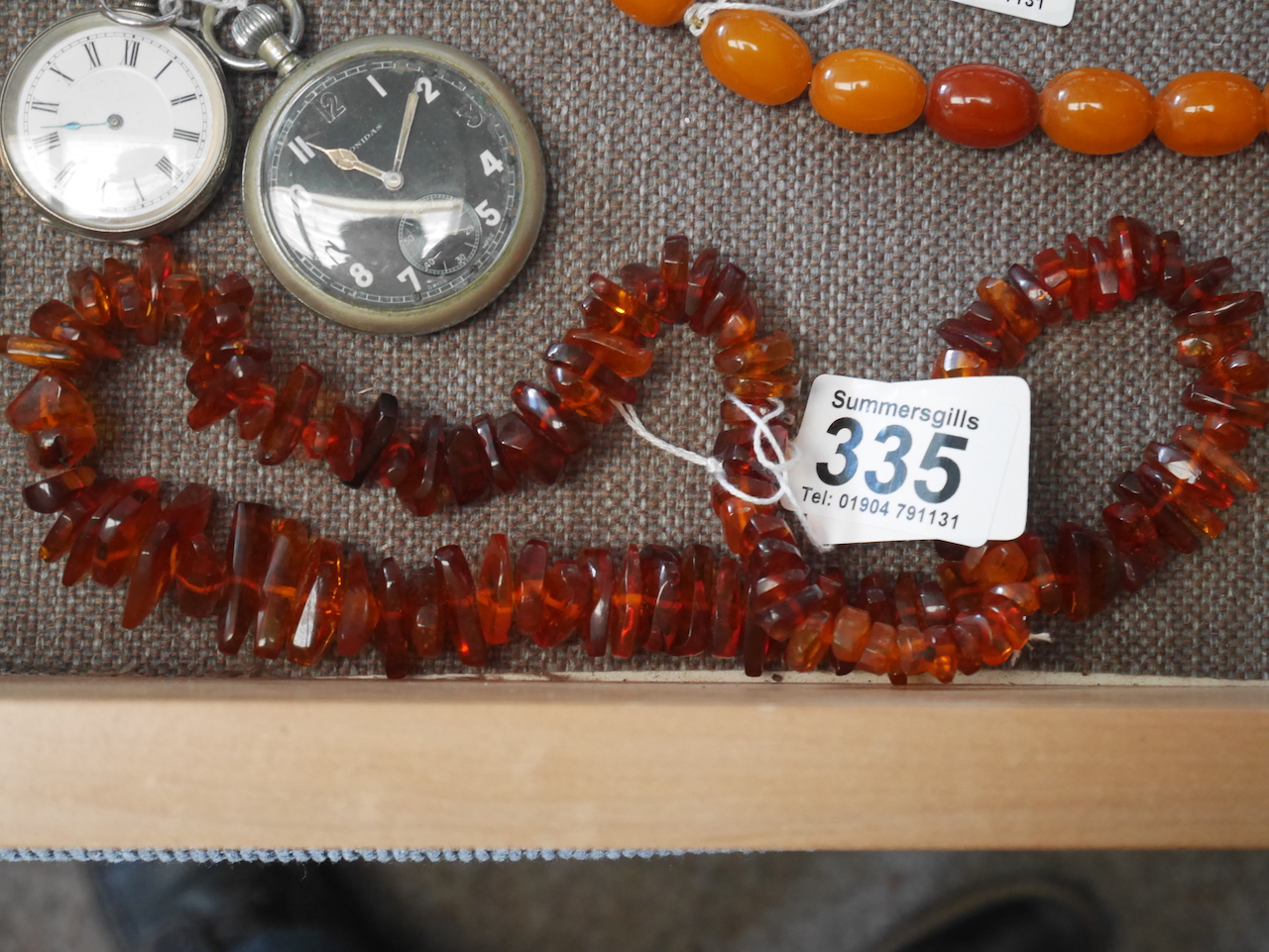 Polished bead string of Amber