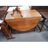 Oak drop leaf dining table