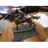 Metal figure of racehorse