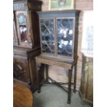 Oriental style mahogany display cabinet