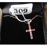 18ct gold and ruby cross on 9ct gold chain