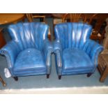 2 Blue leather tub chairs