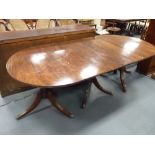 Antique mahogany extending dining table